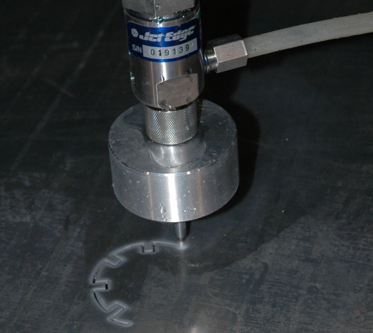 pid03_waterjet-cutting-close-up.jpg